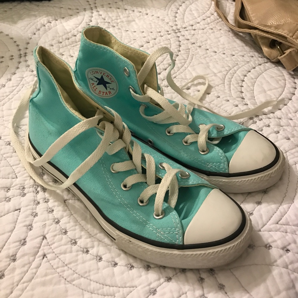 Light blue high top converse